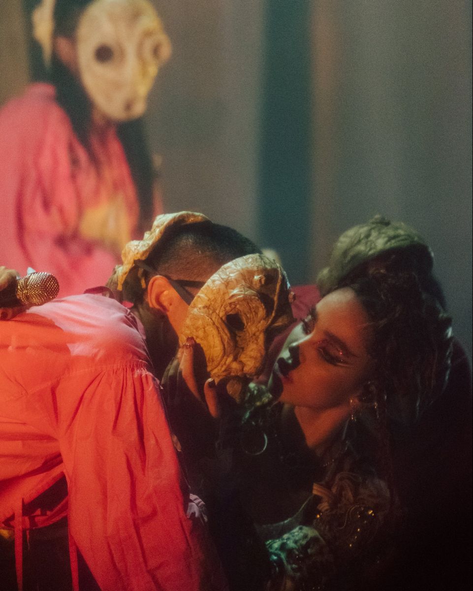 FKA Twigs with masked backup dancers on stage